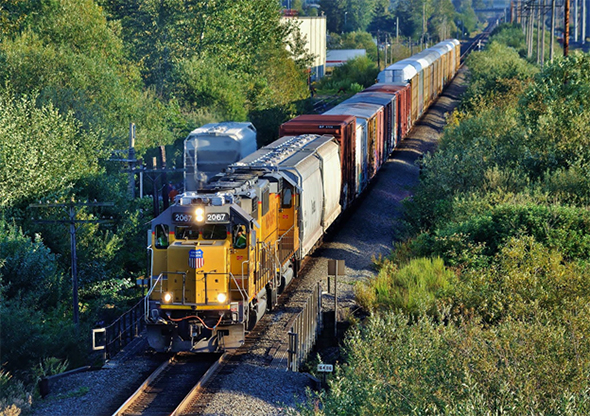 The FRA’s Rail Safety Advisory Committee (RSAC) will meet in September as part of its normal review process. Summer action on tank car standards, crew staffing (like aboard this Union Pacific local train seen in Kent, Washington earlier this month), and Positive Train Control (PTC) are expected to be prominent on the agenda. Image © 8/2016 by Nikki Burgess; all rights reserved.
